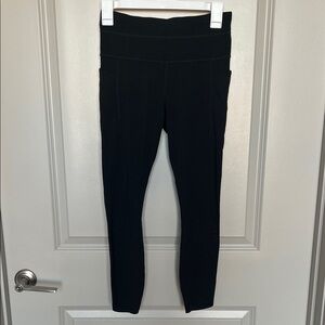 Athleta Black Leggings with Laser Cut Design